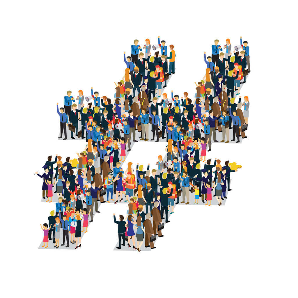 Image of people standing in the shape of a hashtag